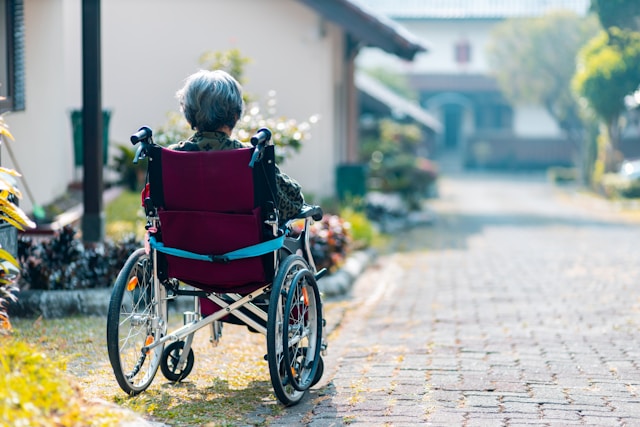 woman in wheelchair outside