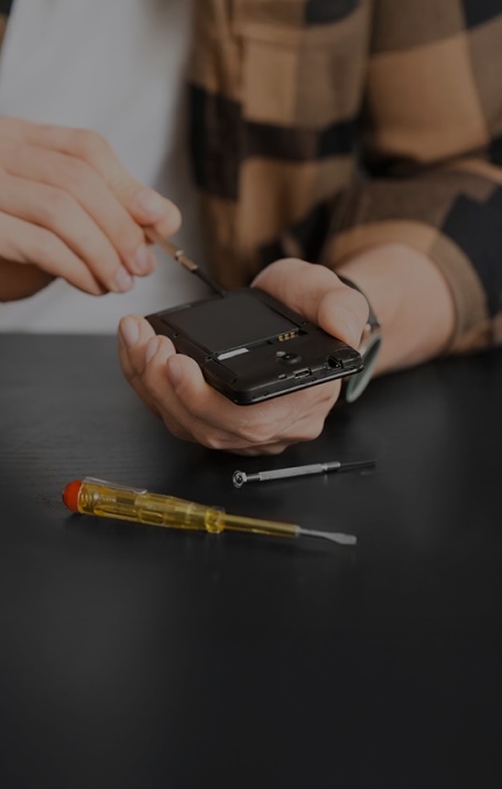 person taking a cell phone apart