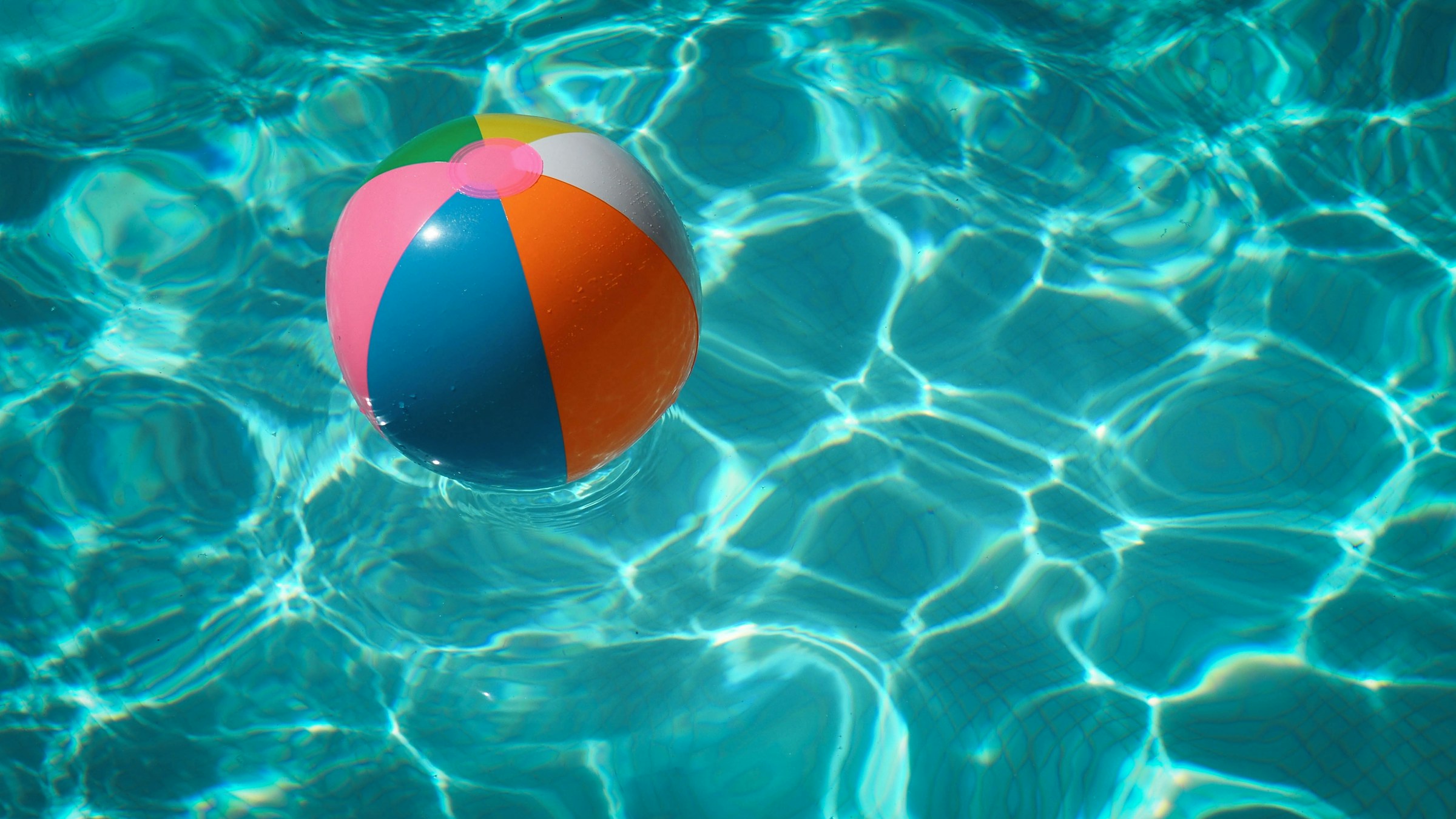 beach ball floating in swimming pool